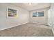 Spacious bedroom with neutral carpeting and ample natural light at 2372 Tyler Way, Decatur, GA 30032