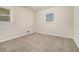 Bright bedroom with neutral walls and carpet at 2372 Tyler Way, Decatur, GA 30032