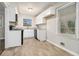 Modern kitchen with white cabinets, granite countertops, and new appliances at 2372 Tyler Way, Decatur, GA 30032