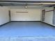Laundry room featuring a washing machine, dryer, shelving, and storage at 35 Fairfield Dr, Ellenwood, GA 30294