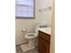 Bathroom with wood cabinets and white countertops, showing two separate sink areas at 35 Fairfield Dr, Ellenwood, GA 30294