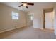 Bedroom with carpet, ceiling fan and mirrored closet doors at 5310 Timbo Ln, Mableton, GA 30126