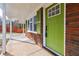 Bright green front door with a white frame and glass window at 5310 Timbo Ln, Mableton, GA 30126