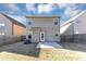 Two-story house with fenced backyard and patio at 6543 Woodwell Dr, Union City, GA 30291