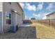 House with fenced backyard, patio, and AC unit at 6543 Woodwell Dr, Union City, GA 30291