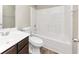 Bathroom with tub, toilet and vanity at 6543 Woodwell Dr, Union City, GA 30291