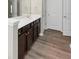 Double vanity with dark brown cabinets and white countertop at 6543 Woodwell Dr, Union City, GA 30291