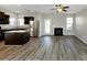 Open concept kitchen with granite countertops and stainless steel appliances at 6543 Woodwell Dr, Union City, GA 30291