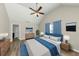 Main bedroom with high ceiling, ceiling fan, and stylish furniture at 6543 Woodwell Dr, Union City, GA 30291