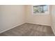Simple bedroom with neutral walls and carpet flooring at 2040 Forrest Park Se Rd, Atlanta, GA 30315
