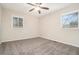Bright bedroom featuring ceiling fan and neutral decor at 2040 Forrest Park Se Rd, Atlanta, GA 30315