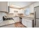 Modern kitchen with white cabinets and granite countertops at 2040 Forrest Park Se Rd, Atlanta, GA 30315