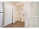 Laundry closet with built-in shelving at 2040 Forrest Park Se Rd, Atlanta, GA 30315