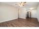Open living room and kitchen area with hardwood floors at 2040 Forrest Park Se Rd, Atlanta, GA 30315