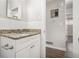 Clean bathroom featuring granite countertop and white vanity at 3395 Springlake Dr, Decatur, GA 30032