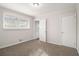 Spacious bedroom with wood paneled walls at 3395 Springlake Dr, Decatur, GA 30032