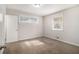 Well-lit bedroom with carpet and neutral walls at 3395 Springlake Dr, Decatur, GA 30032