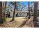 House front view with mature trees at 3395 Springlake Dr, Decatur, GA 30032