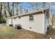 Side view of house showcasing brick exterior at 3395 Springlake Dr, Decatur, GA 30032
