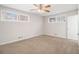 Bright main bedroom with ceiling fan and carpet at 3395 Springlake Dr, Decatur, GA 30032