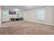 Finished basement with neutral carpeting and plenty of space at 667 Crosshaven Dr, Marietta, GA 30066