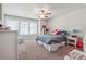 Spacious bedroom with plush carpeting and plenty of natural light at 667 Crosshaven Dr, Marietta, GA 30066