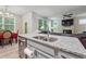 Kitchen island with granite countertop and double sink at 667 Crosshaven Dr, Marietta, GA 30066