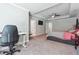 Main bedroom features a large bed, workspace and en-suite bathroom at 667 Crosshaven Dr, Marietta, GA 30066