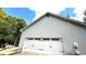 Two-car garage with white doors, enhancing curb appeal at 20 Mountain Ridge Ne Rd, White, GA 30184