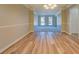 Dining room with hardwood floors and view to the living room at 3071 Springfair Trott, Lithonia, GA 30038