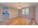 Dining room featuring hardwood floors and a chandelier at 3071 Springfair Trott, Lithonia, GA 30038