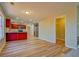 Open concept kitchen and dining area with hardwood floors at 3071 Springfair Trott, Lithonia, GA 30038