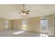Large main bedroom with ceiling fan and multiple windows at 3071 Springfair Trott, Lithonia, GA 30038