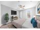 Bright bedroom with a ceiling fan and windows for plenty of natural light at 3091 Colonial Way # E4, Chamblee, GA 30341