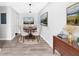 Bright dining room area offers table with seating for four and artwork at 3091 Colonial Way # E4, Chamblee, GA 30341