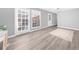 Bright living area features sliding glass doors leading to the outdoor space at 3091 Colonial Way # E4, Chamblee, GA 30341