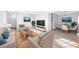 Bright living room showcases neutral tones, wood floors, and comfortable seating at 3091 Colonial Way # E4, Chamblee, GA 30341