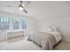 Spacious bedroom with a queen bed and ceiling fan at 425 Hardendorf Ne Ave, Atlanta, GA 30307