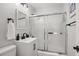 Modern bathroom with white vanity and a glass shower at 215 Piedmont Ave # Apt 2210, Atlanta, GA 30308