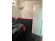 Black and red bathroom with vanity and separate door at 1417 Doe Valley Dr, Lithonia, GA 30058