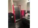 Bathroom with black and red tile, shower, and vanity at 1417 Doe Valley Dr, Lithonia, GA 30058