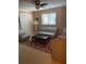 Spacious bedroom with window, carpet, and seating area at 1417 Doe Valley Dr, Lithonia, GA 30058