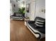 Living Room with two black and white couches at 1417 Doe Valley Dr, Lithonia, GA 30058