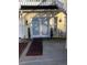 Private patio with double French doors and red carpet runner at 1417 Doe Valley Dr, Lithonia, GA 30058