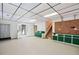 Unfinished basement with workshop area and outside access at 3133 Callie Still Rd, Lawrenceville, GA 30045