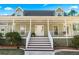 Inviting front porch with white railings and stairs leading to the entrance at 3133 Callie Still Rd, Lawrenceville, GA 30045