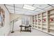 Basement home office features built-in shelving and a large desk at 3133 Callie Still Rd, Lawrenceville, GA 30045