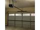 Garage with an automatic garage door opener at 141 Whimsical Ct, Locust Grove, GA 30248