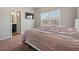 King-size bedroom with an ensuite bathroom at 213 Expedition Dr, Ellenwood, GA 30294