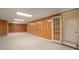 Finished basement offering extra living space and access to the outside at 5513 N Peachtree Rd, Dunwoody, GA 30338
